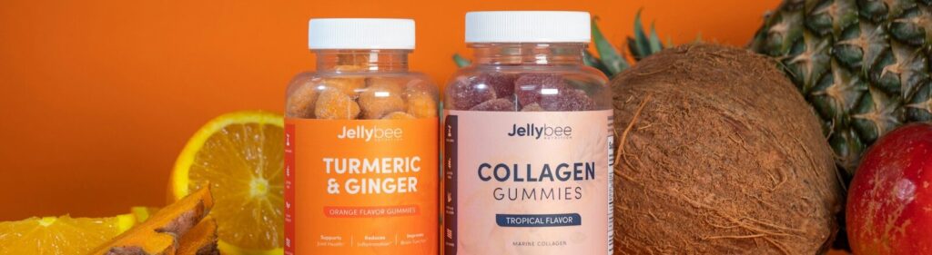 3 glass bottles on brown wooden table